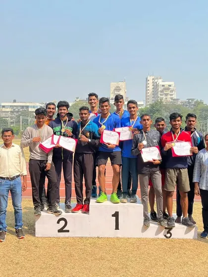 My athletes on the podium after a clean sweep in the relay event at the Mumbai University Zonal Athletics Meet.