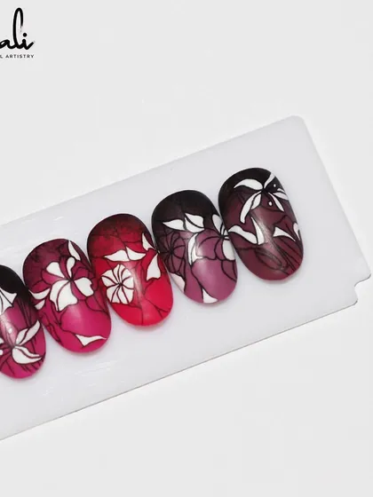 The full set of the floral stamping designs on a sample palette.