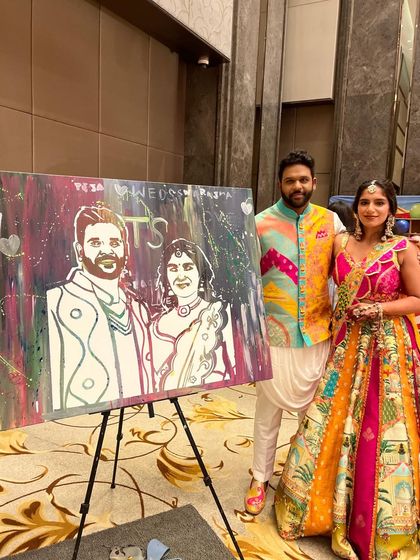 Another beautiful couple posing with their crowdsourced wedding portrait. The final piece is always so full of energy and love.