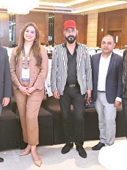Networking with esteemed colleagues at the conference. The exchange of ideas with other leaders in the industry is one of the most valuable aspects of these events.