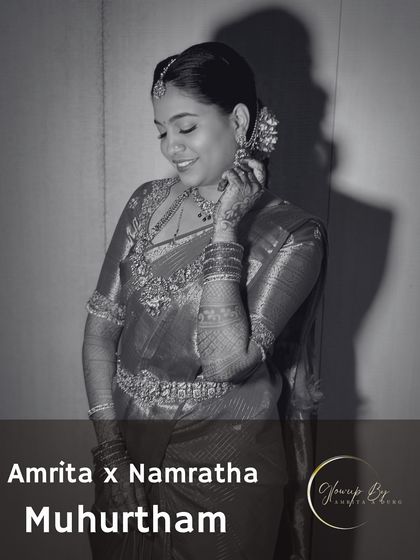 A classic black and white portrait of Namratha, titled 'Amrita x Namratha Muhurtham', capturing the timeless elegance of her bridal look.