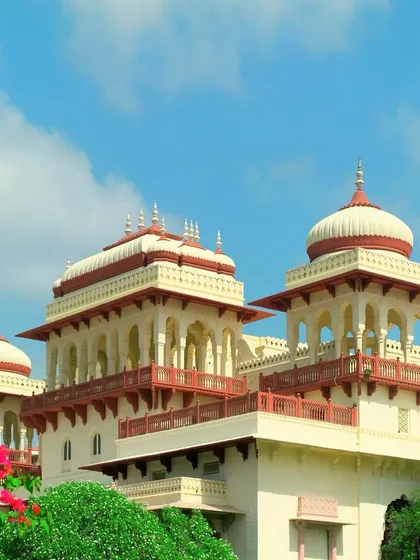 The exterior of the Rambagh Palace Hotel showcases the grandeur of Rajput architecture. My additions were minimal and designed to be in harmony with the original structure, preserving the building's majestic character.