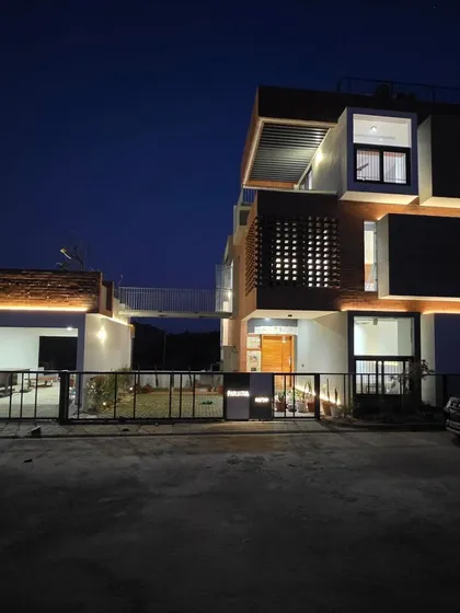 The Tharalu residence at night. I design lighting to accentuate the architectural forms, creating a dramatic and welcoming presence after dark. The illuminated brickwork and cantilevered blocks give the home a completely different character.