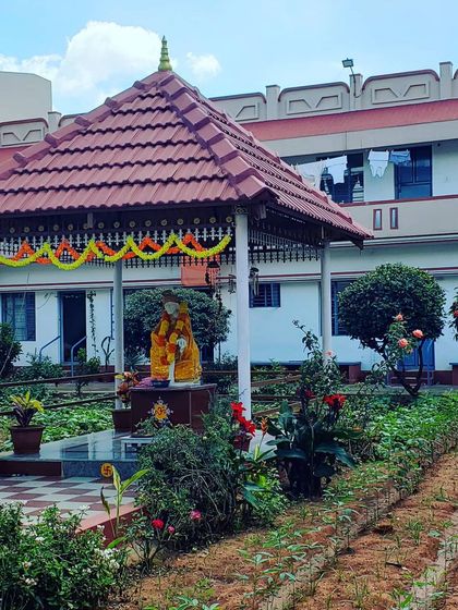 This is a peaceful garden at an ashram. You can create a similar sacred space within your own home. It can be a quiet corner for silent meditation or chanting, a place free from distractions where you can focus on your inner world.