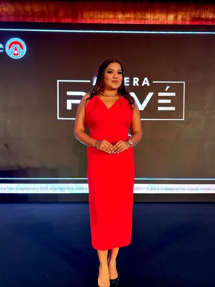 A confident look for the camera before hosting the Ajmera Realty event.