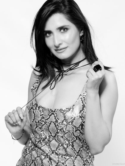 A black and white version of a playful portrait.