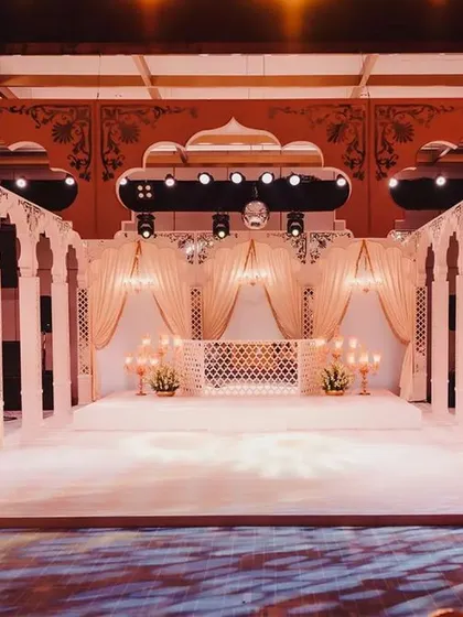 This is what I call a showstopper. For this engagement, we brought the magic of Rajasthan's mystical Mahals to life, creating an opulent palace courtyard that was nothing short of a royal gathering.