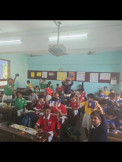 Another shot of the enthusiastic students at Our Lady of Salvation High School, proud of the Christmas-themed clay art they made.