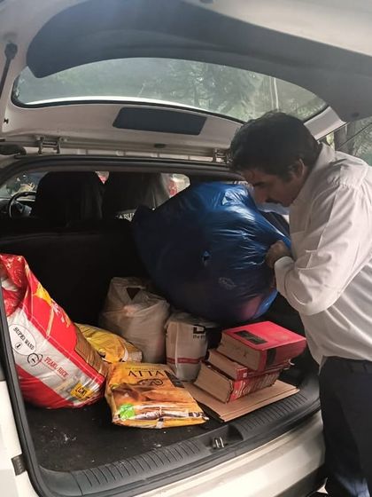 Preparing to distribute essentials to those who need them. It's a small effort to bring some relief and support to my community.