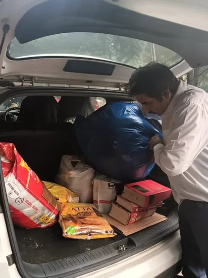 Preparing to distribute essentials to those who need them. It's a small effort to bring some relief and support to my community.