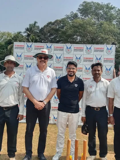 A group photo with the coaches, umpires, and officials at the start of the Dream11 Cup.