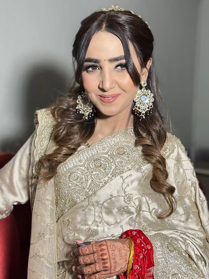 Unfiltered and beautiful. This close-up shows the details of her engagement makeup, with soft brown smokey eyes and a flawless base that looks like real skin.