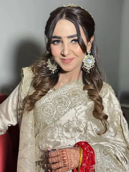 Unfiltered and beautiful. This close-up shows the details of her engagement makeup, with soft brown smokey eyes and a flawless base that looks like real skin.