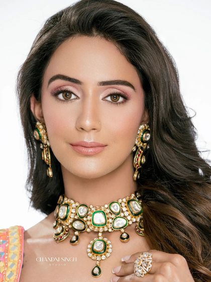 A minimalistic makeup look with neon accents from Day 1 of a pro course. The final professional photograph shows students the high-quality images they will learn to create.