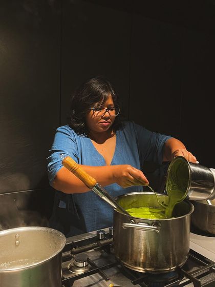 Cheesemaker Namrata Sundaresan of Käse preparing a dish. Her pop-up was a beautiful marriage of cheese and Chennai, demonstrating how regional Indian flavors can be infused into artisanal cheesemaking.
