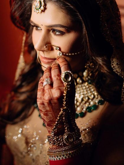 A detailed shot of a bride's look, with her hair in elegant waves.