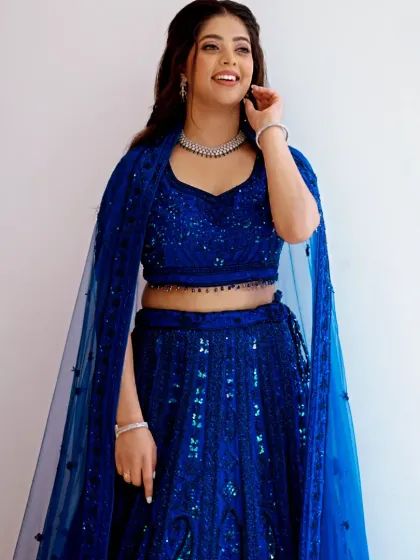 For an engagement or reception, a pop of colour can be magical. Here, I created a glamorous look to match this stunning royal blue lehenga. The makeup features softly defined eyes and a glowing complexion, ensuring the bride feels confident and looks radiant throughout her celebration.
