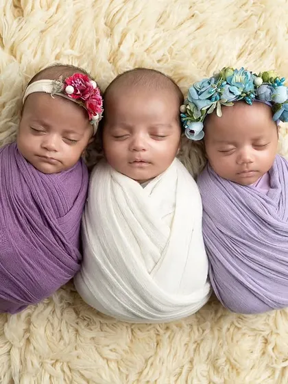 Capturing one newborn is special, but three is a blessing. This photo of triplets, each swaddled comfortably, shows my experience in safely handling and posing multiples for a beautiful, coordinated portrait.
