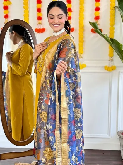 I love the combination of mustard and blue in this viscose chanderi kurta set. The printed dupatta is the star of this outfit.