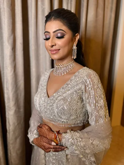 Another angle of this chic engagement makeup. The focus is entirely on the eyes, with the rest of the makeup kept clean and fresh.