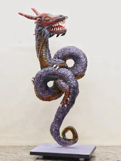 My award-winning Ouroboros dragon cake, a gravity-defying sculpture that represents the eternal cycle of rebirth. This complex structure is a true feat of cake engineering.