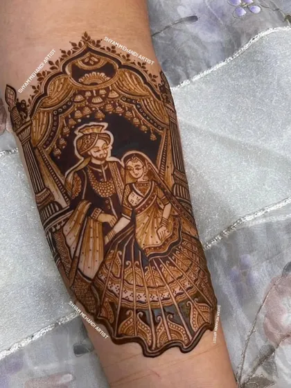 A close-up of a romantic couple portrait, framed beautifully within an ornate arch on the forearm.