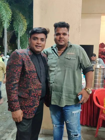 Another snapshot from a fun-filled event, standing with one of the local personalities who attended the show.
