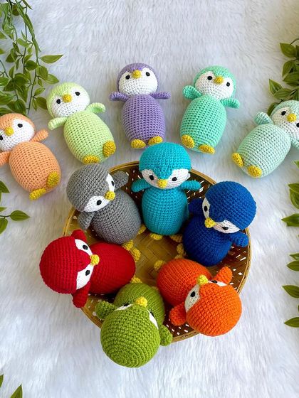 A rainbow of penguin babies! I made this colorful flock as return gifts for a birthday party. Each penguin is a different color, making them a unique and memorable party favor.