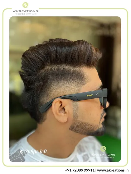 This stylish cut features a mid-fade with a longer, textured top. It's a versatile look that can be styled in multiple ways.
