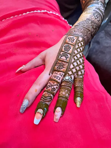 A modern way to tell your story. This design incorporates the wedding date, initials, and symbols representing the couple's journey on the fingers, like a story timeline.