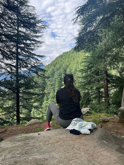 Taking a moment to just sit and breathe, surrounded by the tall pines of the forest. Nature is the greatest healer and teacher.