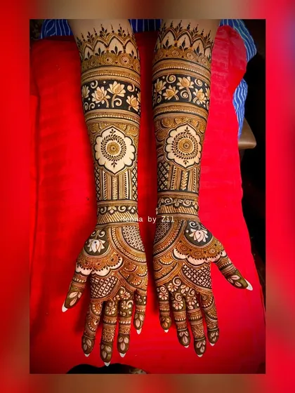 A stunning full-arm design created by my talented team, featuring bold lotus mandalas and floral bands.