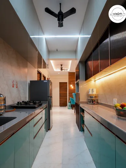 A full-length view of the galley kitchen, showing the clean lines and efficient use of space.
