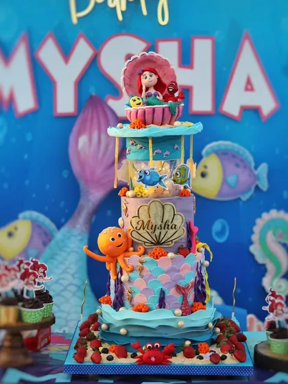 The full Little Mermaid cake in its party setting.