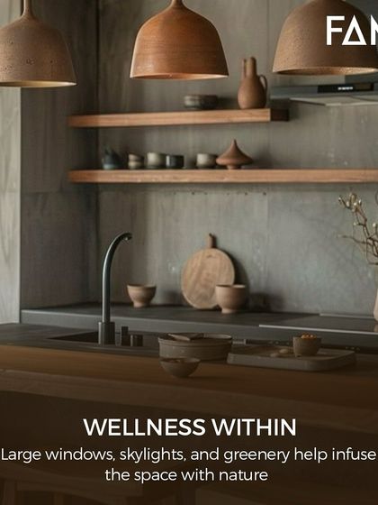 Wellness within the home is a key Japandi principle. Large windows, skylights, and touches of greenery help to infuse this kitchen space with nature, creating a serene and healthy environment.