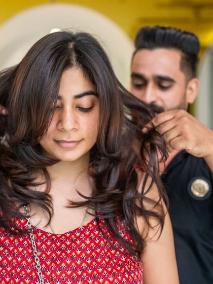 The art of styling. Our expert stylist shapes the hair to enhance the fresh cut and create a soft, feminine silhouette.