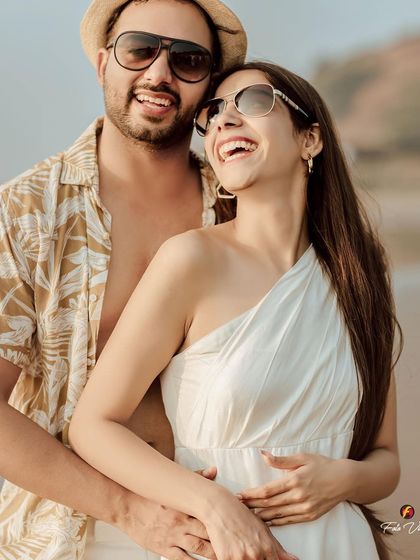 A candid, sun kissed portrait from a beach pre wedding shoot. We use natural light to create warm and romantic images that feel effortless.
