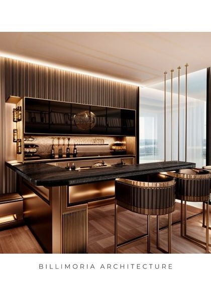This home bar is designed for sophisticated entertaining, featuring a black marble countertop and gold-accented bar stools. The fluted wood back panel and integrated backlighting create a warm, intimate, and luxurious ambiance.