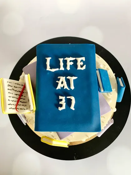 Would you read this cake or eat it first? This "Life at 37" cake is for the book lover who is aging like a bestseller.