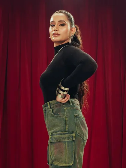 An edgier look for the Freakins campaign, featuring a high ponytail with long, flowing waves and a defined smokey eye. This style is perfect for a confident and modern brand identity.