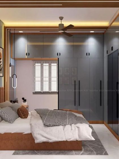 A render of a bedroom with a cool grey and wood theme, featuring a large glass-fronted wardrobe and a cozy, modern feel.