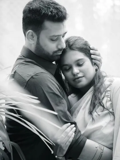 Black and white photography adds a timeless and emotional depth. This series of candid, close-up shots focuses purely on the couple's connection and affection.
