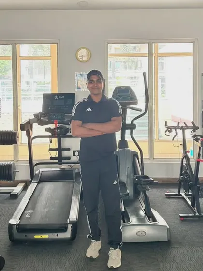 Standing in the gym in Noida Sector 45, surrounded by the tools we use to build stronger bodies.