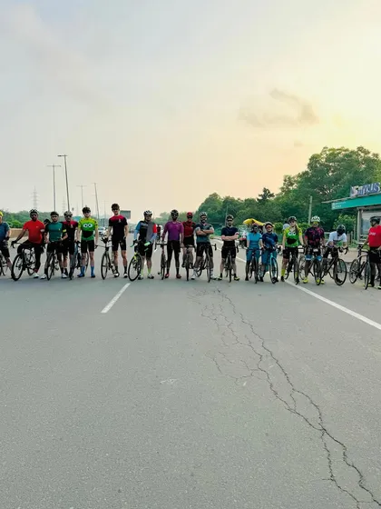 The group posing together for a birthday ride.