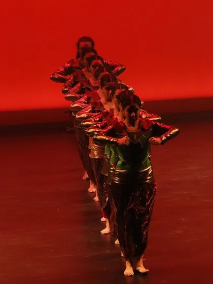 A dynamic shot from our 'Bahurang' performance in Portland. This piece showcases the energy and versatility of our dancers, blending traditional Kathak with contemporary choreographic patterns.