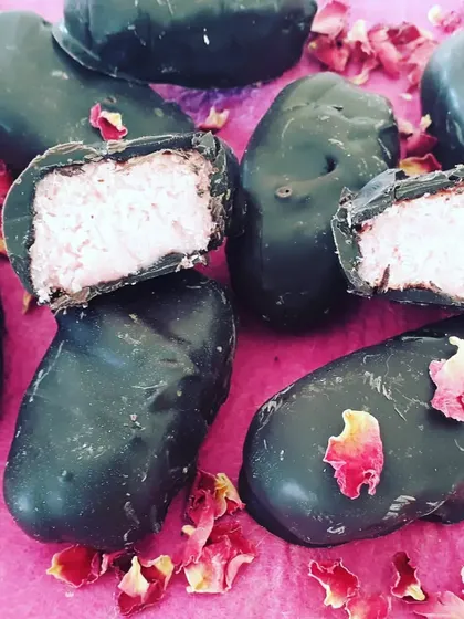 My take on the classic Bounty Bar, made with a sweet, rose-flavoured coconut filling and coated in rich dark chocolate. It's a decadent, plant-based chocolate treat.