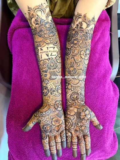 A full view of the 'Samra weds Zohaib' design, showing how the text is placed on the forearm.