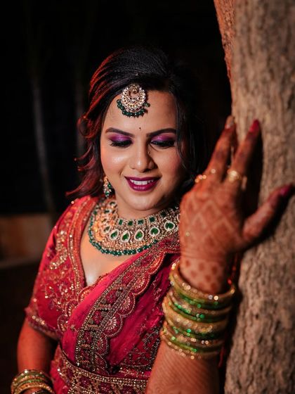 Another angle of Supriya's dramatic reception makeup, showing the beautiful blend of colors on her eyelids.