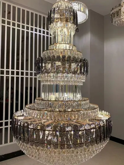 For spaces that demand pure opulence, I offer grand crystal chandeliers like this multi-tiered masterpiece. This is a modern take on the classic jhumar, designed to create a breathtaking cascade of light in a double-height foyer or a luxurious ballroom.