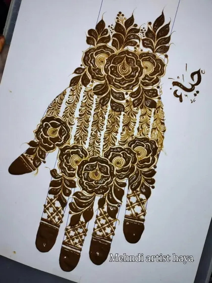 A practice design featuring large, blooming roses connected by delicate vine work. The use of negative space here is just as important as the positive design elements.